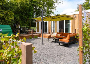 Ralreiger Chaletlodge met airco, tuin op het zuiden en fietsenberging